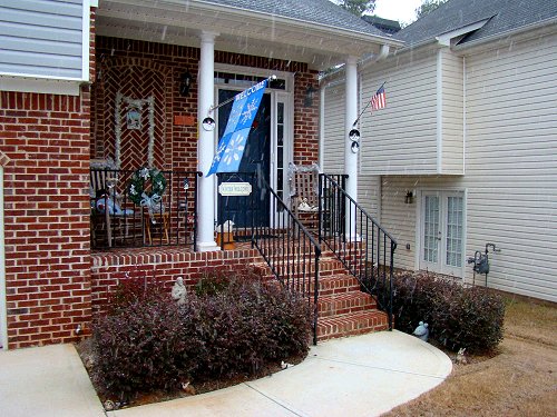 Snow around the porch