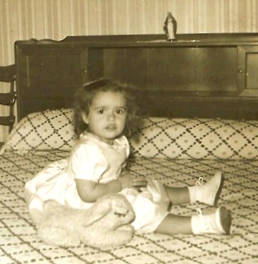 me, age 2, with stuffed bunny