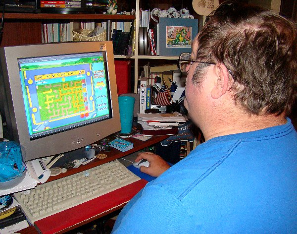 James at his computer