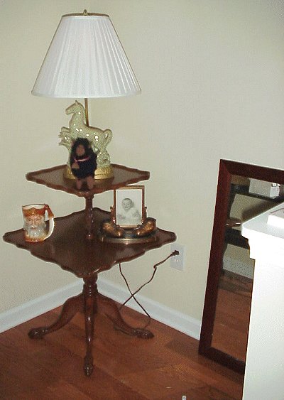 Mom's tier table in foyer with horse lamp